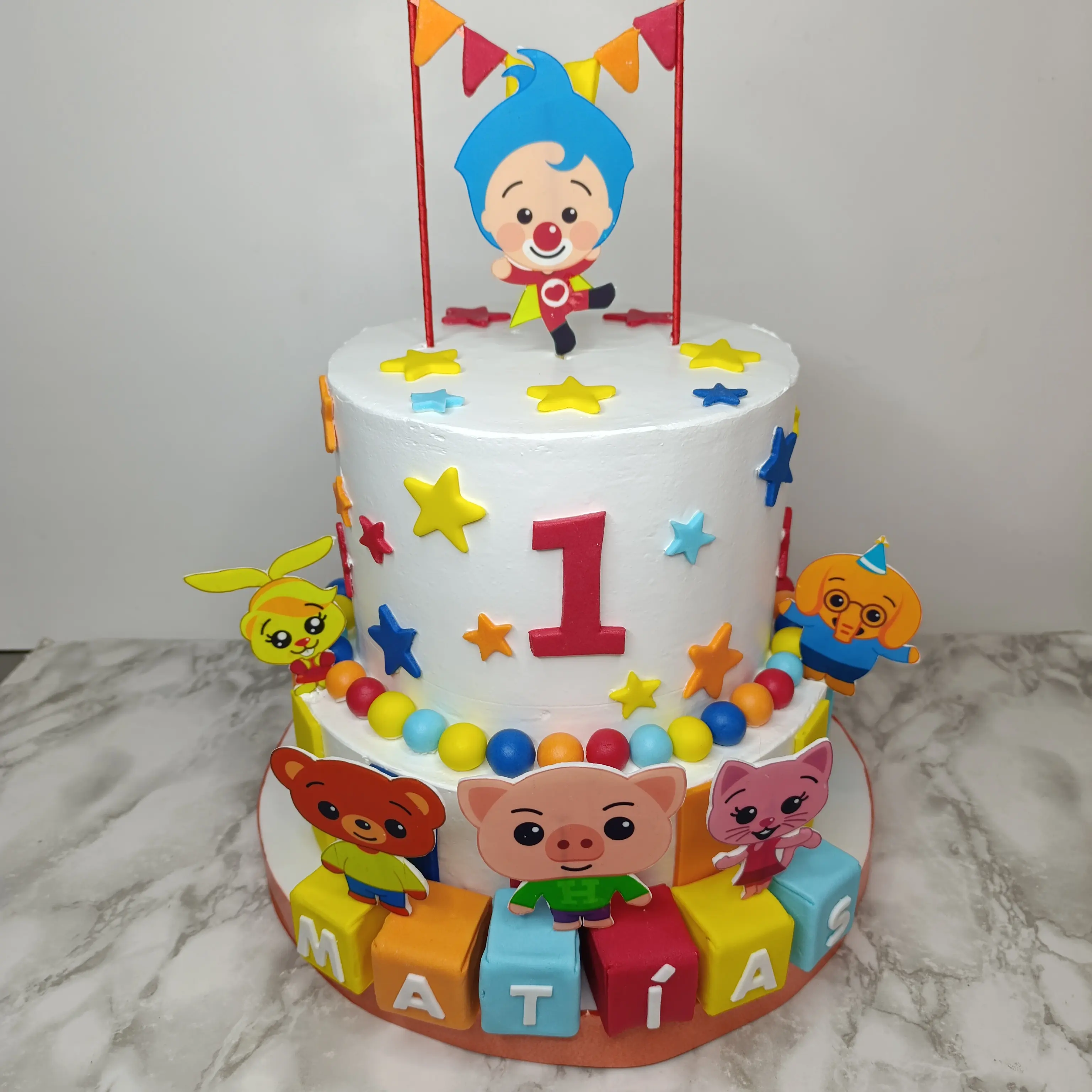 Pastel personalizado, para fiesta infantil, con tematica de Plin Plin. detalles en fondant y crema elaborado por Pasteleria Capital Tarta